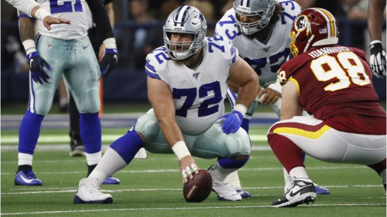 In this Dec. 15, 2019, photo, Dallas Cowboys center Travis Frederick (72) plays in the first half of an NFL football game against the Washington Redskins in Arlington, Texas. Frederick is retiring from the NFL at 29. The surprising decision comes less than two years after Frederick was diagnosed with a neurological disorder that sidelined him for all of 2018. (AP Photo/Roger Steinman)